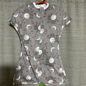 Sleeping baby zipadee-zip sleep sack.